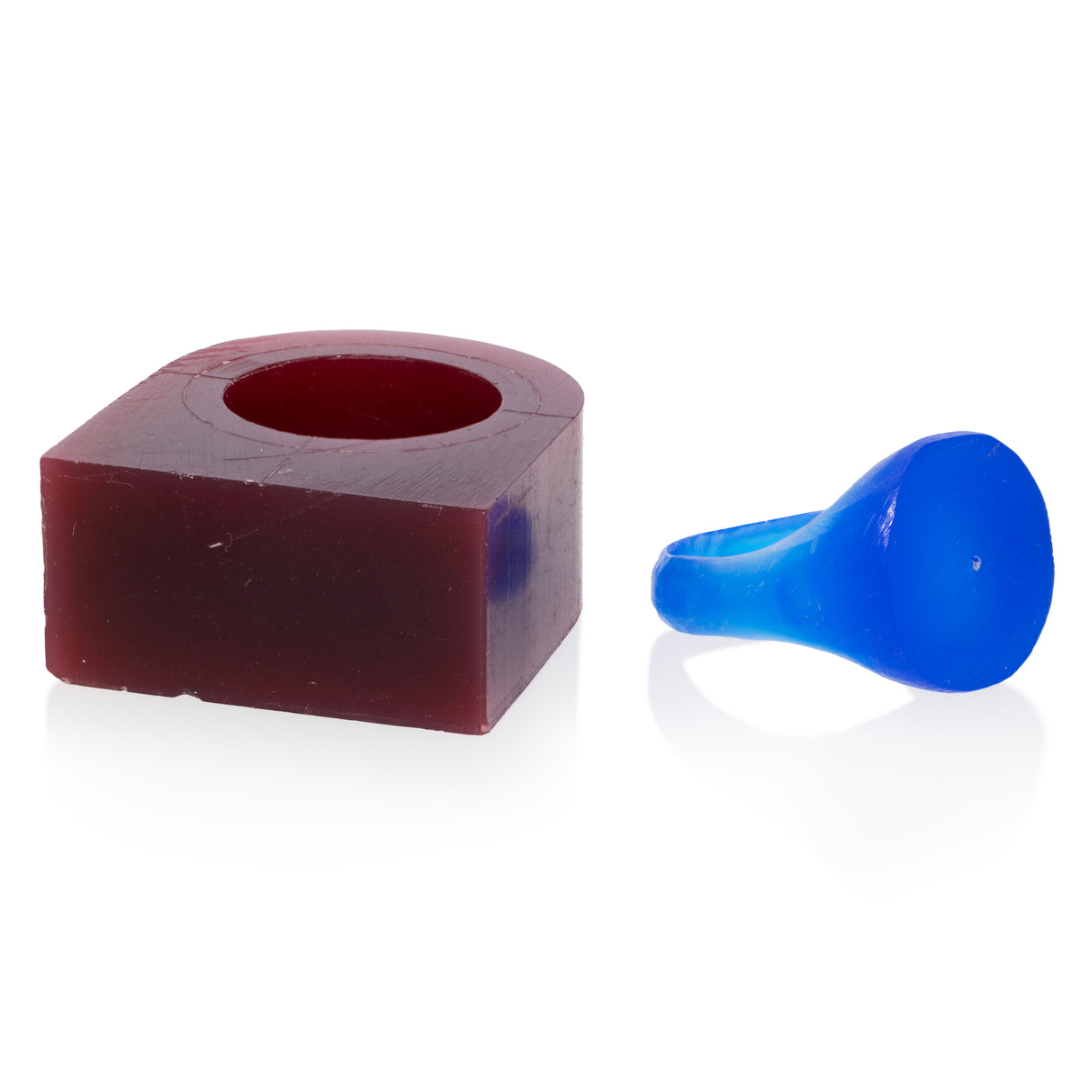 Purple and blue wax models of rings, shown on a clean white background.